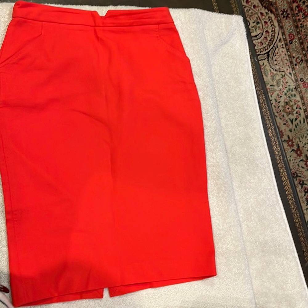 Zara bright red knee length skirt with 2 pockets. Zipper back  M.  Size 4